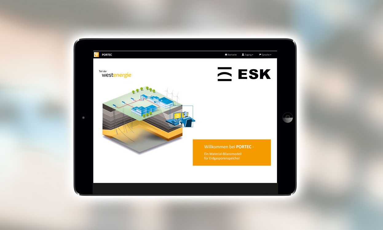 Black tablet with ESK software PORTEC against a blurred background