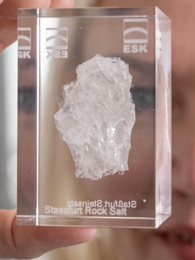 Andrea Wobito with a rock of glass